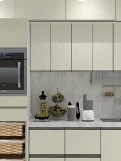 A minimalist kitchen design in all-white, featuring a tall unit for a built-in oven and pull-out wicker baskets for vegetable storage. This showcases our focus on integrated and practical solutions.