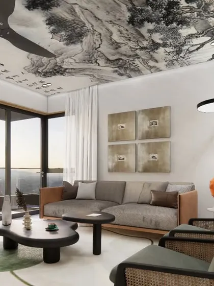 The lounge area in the Renaissance Bellevue penthouse, featuring a stunning custom-painted ceiling, a mix of modern and classic furniture, and large windows that open onto a balcony with city views.