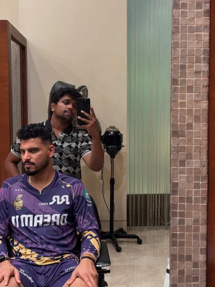 A mirror selfie after giving KKR's Vaibhav Arora a fresh cut. The right hairstyle complements the athletic vibe.