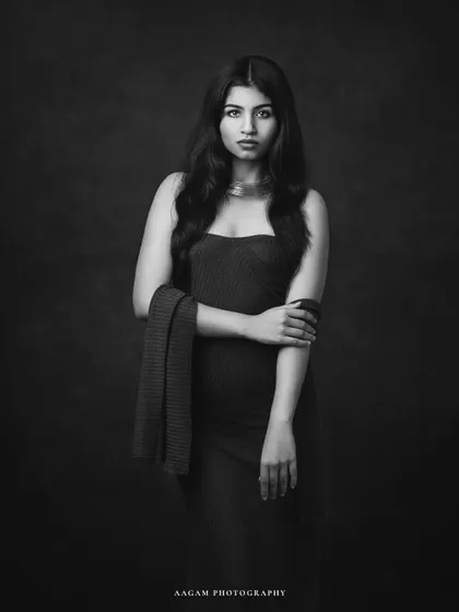 The art of stillness. This black and white portrait is strong and direct, focusing on the subject's powerful presence and gaze.