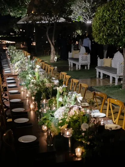 The atmosphere of the welcome dinner, with warm lighting, beautiful tablescapes, and a relaxed vibe, setting the perfect tone for the days to come.