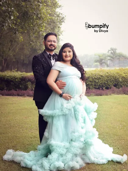 A fairytale moment for a mom to be. This outdoor maternity session features one of our gorgeous flowing gowns, turning a beautiful garden into a magical backdrop for her pregnancy photoshoot.