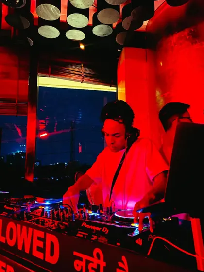 A view from the DJ booth, overlooking the city at night. I often play at terrace parties and venues with a great atmosphere.