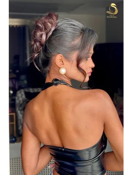 The back view of the textured French twist, highlighting the beautiful woven details and the contrast in texture.