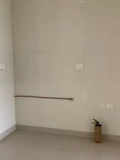 An empty shot of the kitchen before renovation, showing the blank canvas we had to work with.