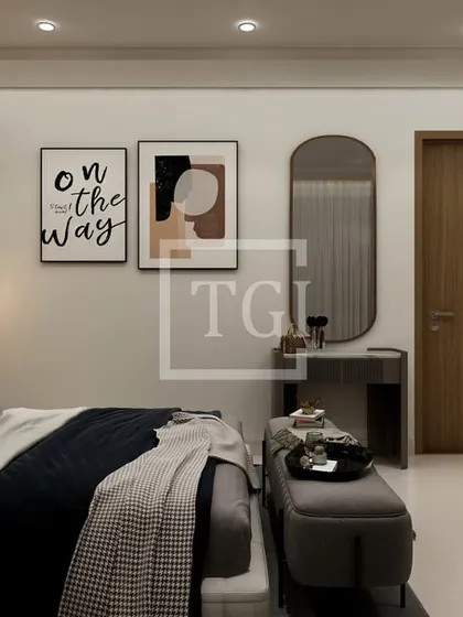 A bedroom concept that focuses on creating a serene and personal corner. The design includes a simple vanity table, modern art prints, and soft lighting for a calm and relaxing atmosphere.