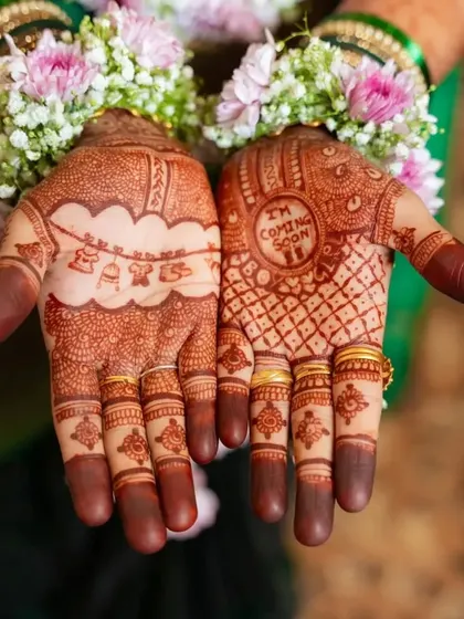 Celebrating a new life with special baby shower mehendi. I designed this with cute motifs like a baby cradle and the sweet message 'I'm Coming Soon' to make the mom-to-be's celebration even more memorable.