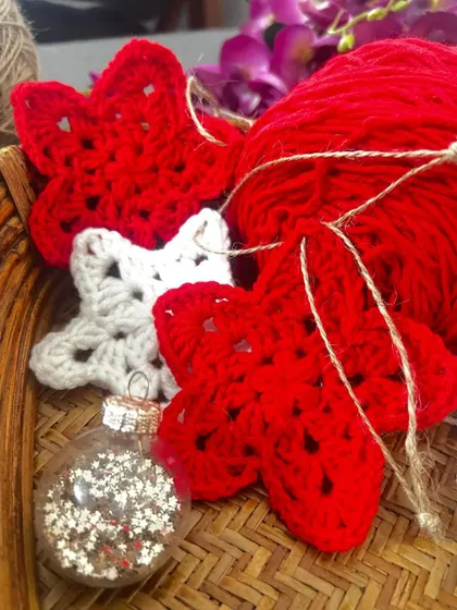 A festive collection of my red and white star ornaments, ready to be hung on the tree. They add a lovely handmade, rustic charm to your holiday decor.
