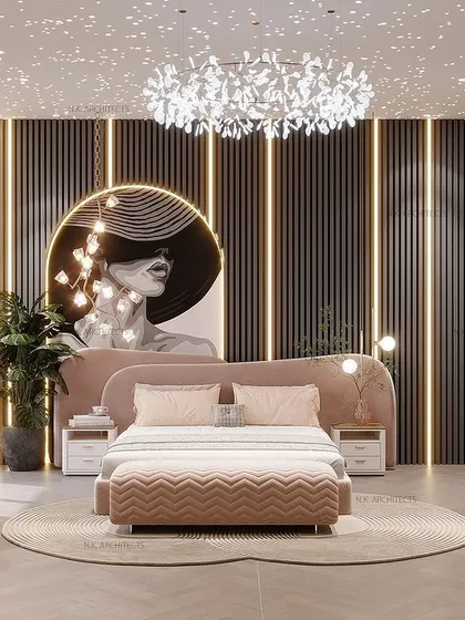 Another angle of the pink and grey luxury room, focusing on the bed with its custom headboard, statement art, and unique chandelier.