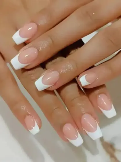A clean and classic square-tipped French manicure. This is a go-to style for a professional and polished look that never fails.