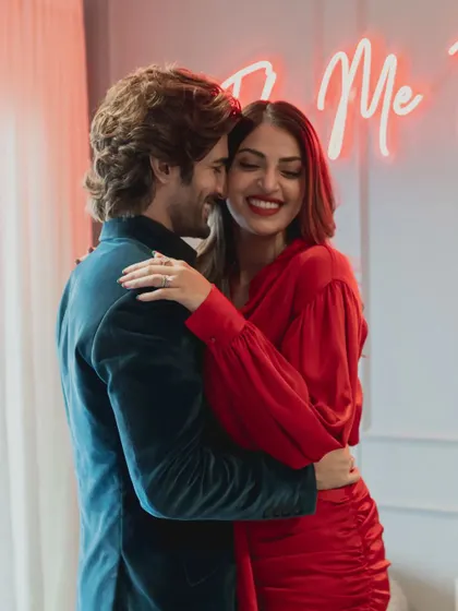 A romantic and fun pre-wedding shoot with a neon sign. This image shows how we can create a modern and playful vibe for couples who want something different.
