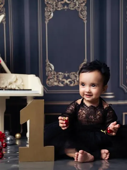 One year old and ready to celebrate! A beautiful shot capturing the joy of this major milestone.