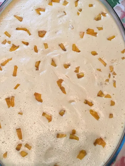 Another look at my mango dessert, topped with small pieces of candied fruit. It's a light and fruity option to balance out a rich meal.