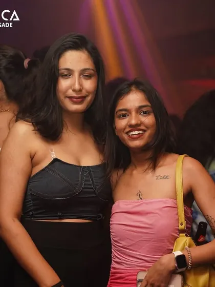 A group of friends enjoying the music at Toca.