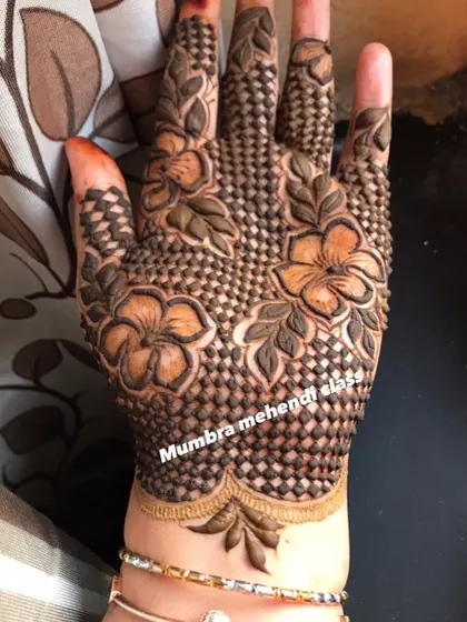 A beautiful design with hibiscus flowers and a checkered net pattern.