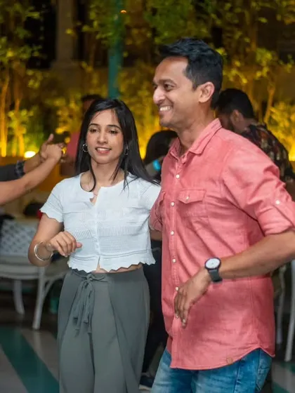 A relaxed and happy couple enjoying the music. The casual vibe makes everyone feel at home.