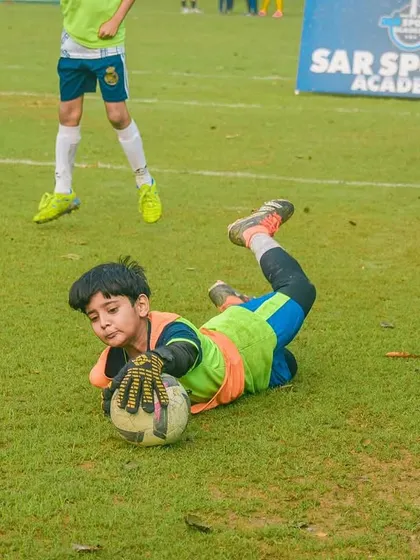 A goalkeeper's heroic dive. These are the moments of bravery that define a player's character, and I am proud to see it in my tournaments.