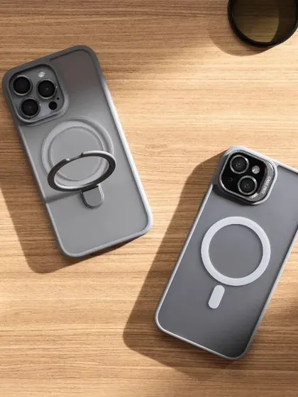 A lifestyle flatlay for Fusegear iPhone cases. We created a realistic desk setup with other tech accessories like an Apple Watch and AirPods, using harsh light to simulate sunlight coming through a window.