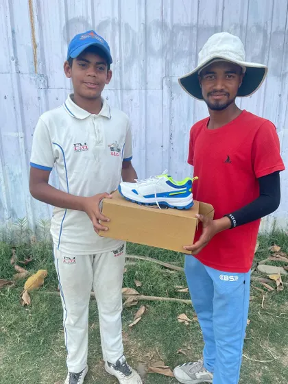 Mohit Vats being awarded for his excellent bowling performance in the tournament.
