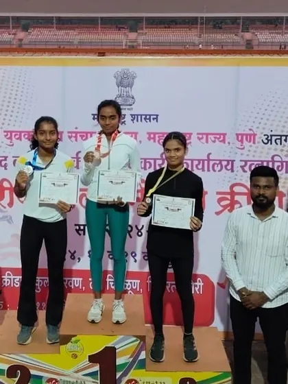 Standing on the podium after a successful 100m hurdles race, a testament to consistent practice and technical refinement.