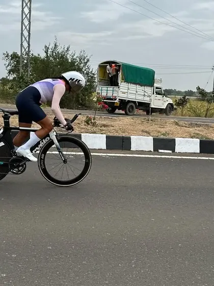 Riding with a disc wheel during the ITT. This equipment choice is all about maximizing speed on a rolling course.