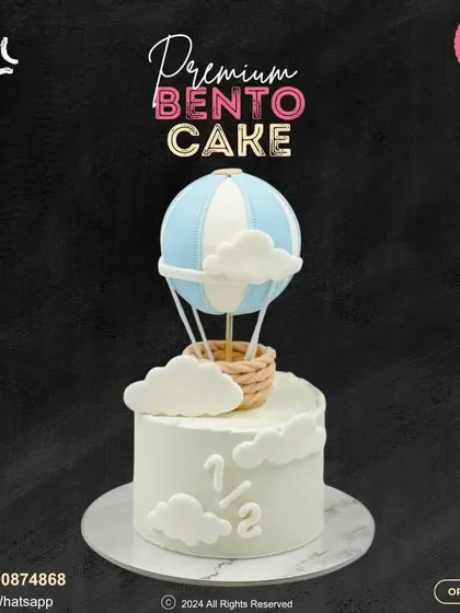Up, up, and away! This premium bento cake is perfect for a half-birthday milestone, featuring a beautiful hot air balloon floating among the clouds.