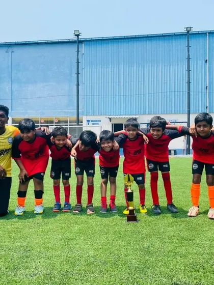 Our U-9 champions with their coaches and their TFP Cup trophy. A proud moment for our future stars.