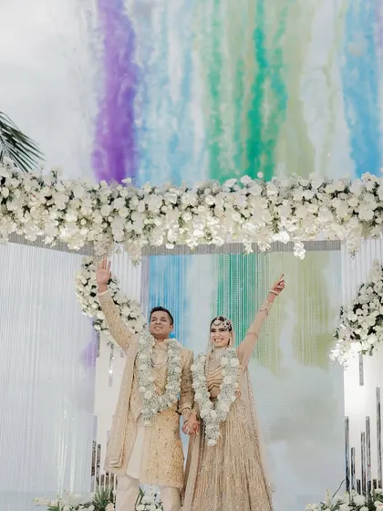 A blast of color to celebrate their union! The rainbow smoke bombs created a stunning visual for this Goa wedding.