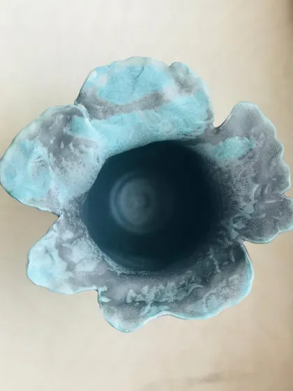 A top-down view of the Wild Petal Vase, showing the beautiful, organic shape and the way the glaze pools in the center.