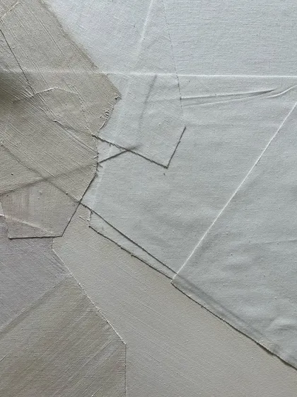 A close-up of a textured white-on-white abstract piece in progress. I love exploring the subtle interplay of texture, shadow, and form.