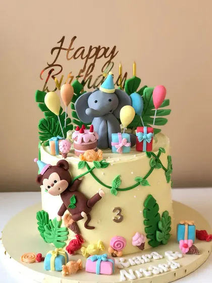 A fun twist on a jungle theme, with wild animals on a sugar rush, surrounded by candy and presents.