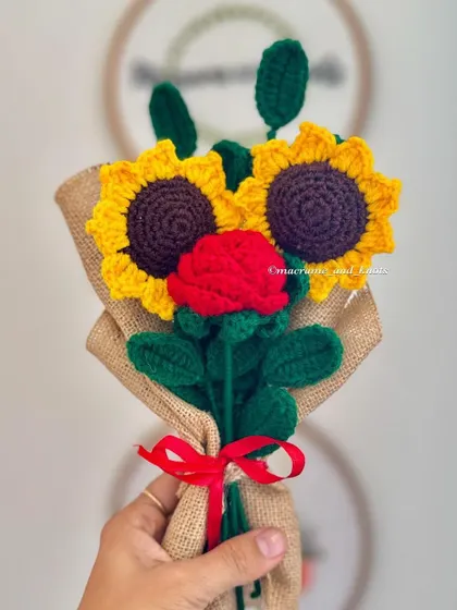 I love combining different flowers, like in this rustic bouquet of crochet sunflowers and a single red rose, wrapped in burlap for a Valentine's Day order.