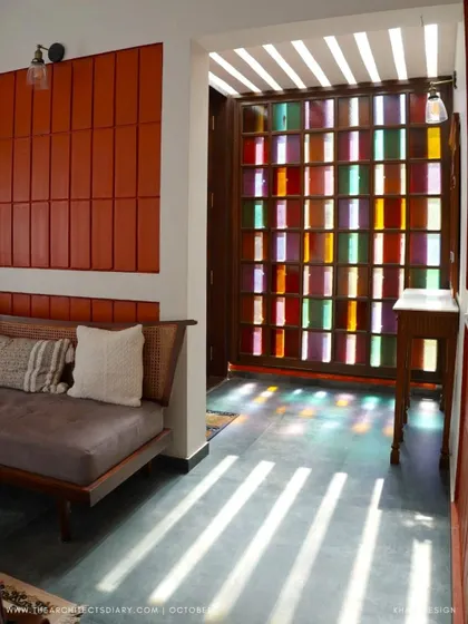 Color and light can create magic. For the Raghunath Farmhouse in Kotagiri, I designed this entryway screen using colored glass panes. As sunlight streams through, it casts a vibrant, shifting mosaic on the floor, turning the simple act of entering the home into a joyful and artistic moment.