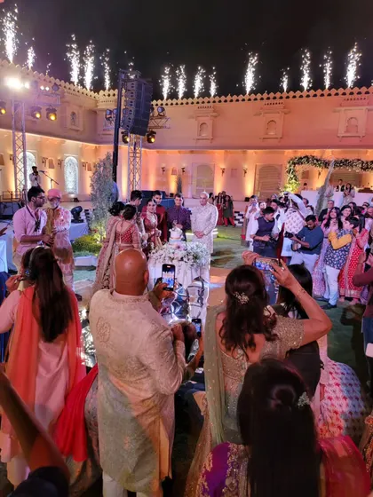 The cake cutting ceremony under a sky of fireworks. We help plan and coordinate key moments of your celebration to create a truly spectacular and memorable event for you and your guests.