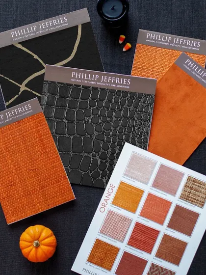 We love curating palettes for every occasion, even Halloween. This flat lay for Phillip Jeffries showcases a range of textures, from bold orange weaves to faux crocodile leather, demonstrating the versatility and creativity of our collections.