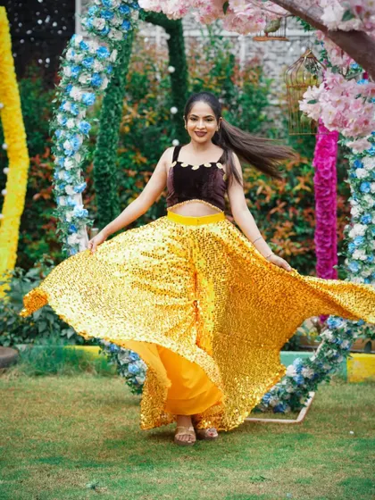 This look was for a vibrant outdoor fashion shoot. I focused on creating a fresh, glowing base with soft glam makeup that enhances the model's features without overpowering the festive, sparkling outfit.