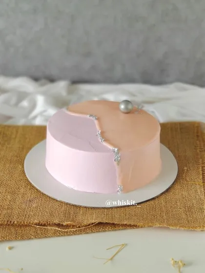Another view of the two-toned pink and peach cake, a simple and elegant design for any occasion.