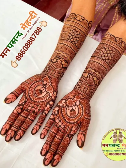 A lovely design featuring a central mandala with a kalash (pot) motif. The surrounding floral patterns add to its festive and auspicious feel.