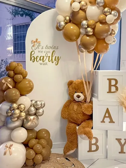 "It's twins, we can bearly wait!" A cute and clever teddy bear theme for a twin baby shower, using a rich brown and gold color palette.