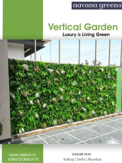 Luxury is living green. This outdoor vertical garden creates a dense, private green wall that enhances the exterior of the home. It's a perfect, sustainable alternative to a plain fence or wall.