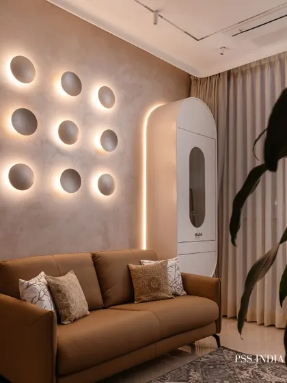 Lighting is jewelry for the home. This sculptural wall installation is a perfect example. During the day, it's a piece of art; at night, it casts a soft, ambient glow, transforming the entire mood of the room with quiet drama.