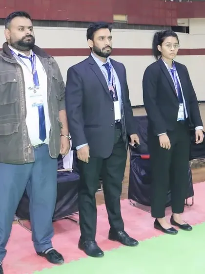 Our technical officials and leadership team are pictured here at a national event. We emphasize professionalism and adherence to the highest standards in all our organized competitions and training programs.