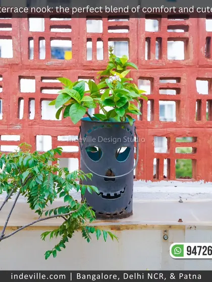 A fun and quirky planter with a spooky face, adding a touch of personality to this terrace garden. I believe in adding small, unique details that make a space truly yours.