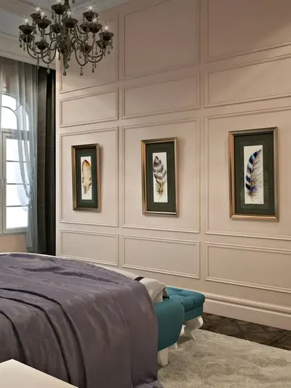 A view of the same bedroom, showing a partition wall that creates a private seating nook behind the bed.
