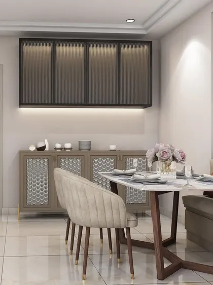 A dining area concept for a Greater Noida project, featuring a custom dining bench, a marble-top table, and a sleek, modern crockery unit with fluted glass doors.