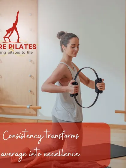 Consistency transforms average into excellence. A client uses the magic circle in our studio, surrounded by equipment that supports her journey.