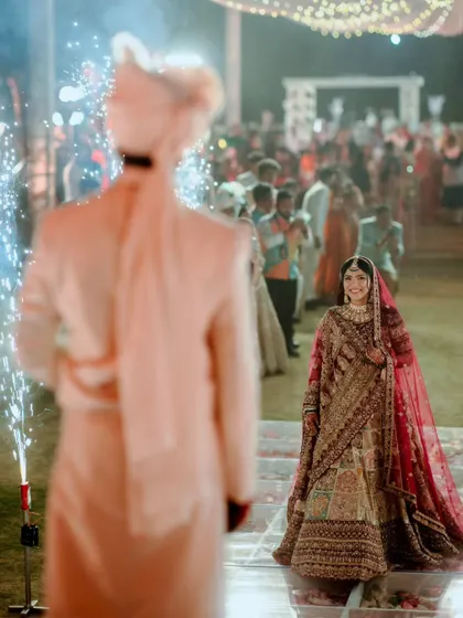 The bride's grand entrance, with her path lit by sparkling cold pyros. I love using special effects to create these picture-perfect, dramatic moments.