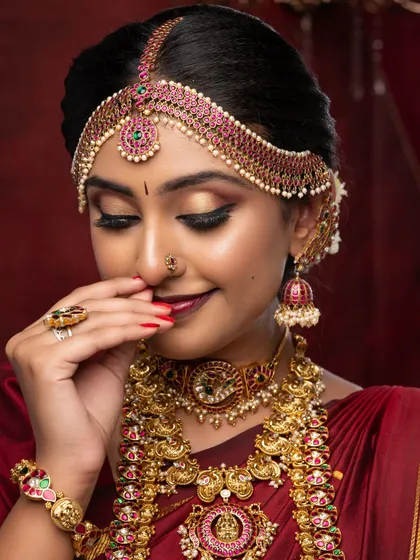 This image highlights the intricate matha patti and eye makeup, demonstrating the precision our students learn.