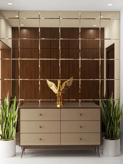 A foyer should be both beautiful and functional. I designed this space with a stunning gold grid mirror to create a sense of depth, a sleek console for storage, and live plants to bring a touch of nature indoors.