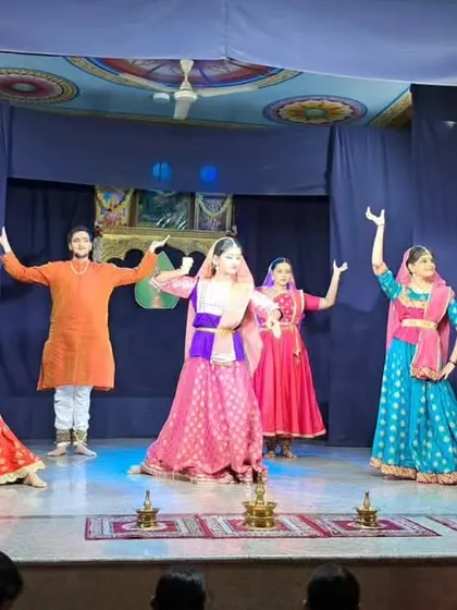 A vibrant group performance by our Kathak students. The colorful costumes and synchronized movements create a beautiful spectacle on stage.